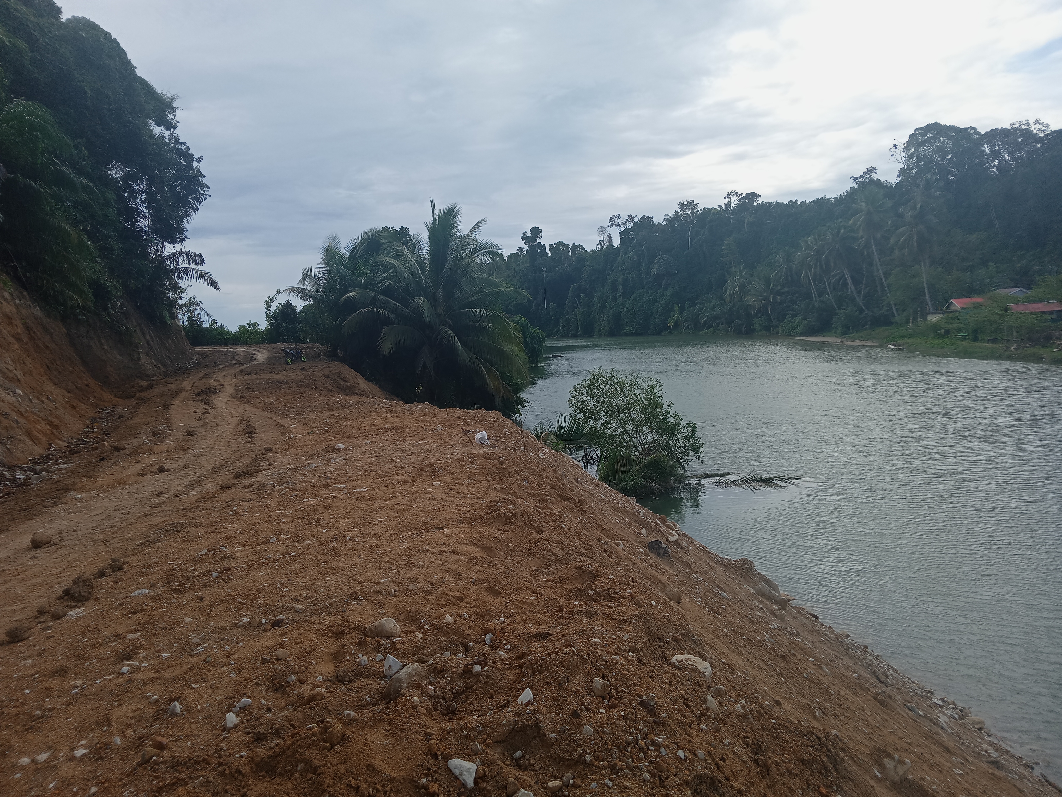 Pengupasan Jalan DAS Sambat